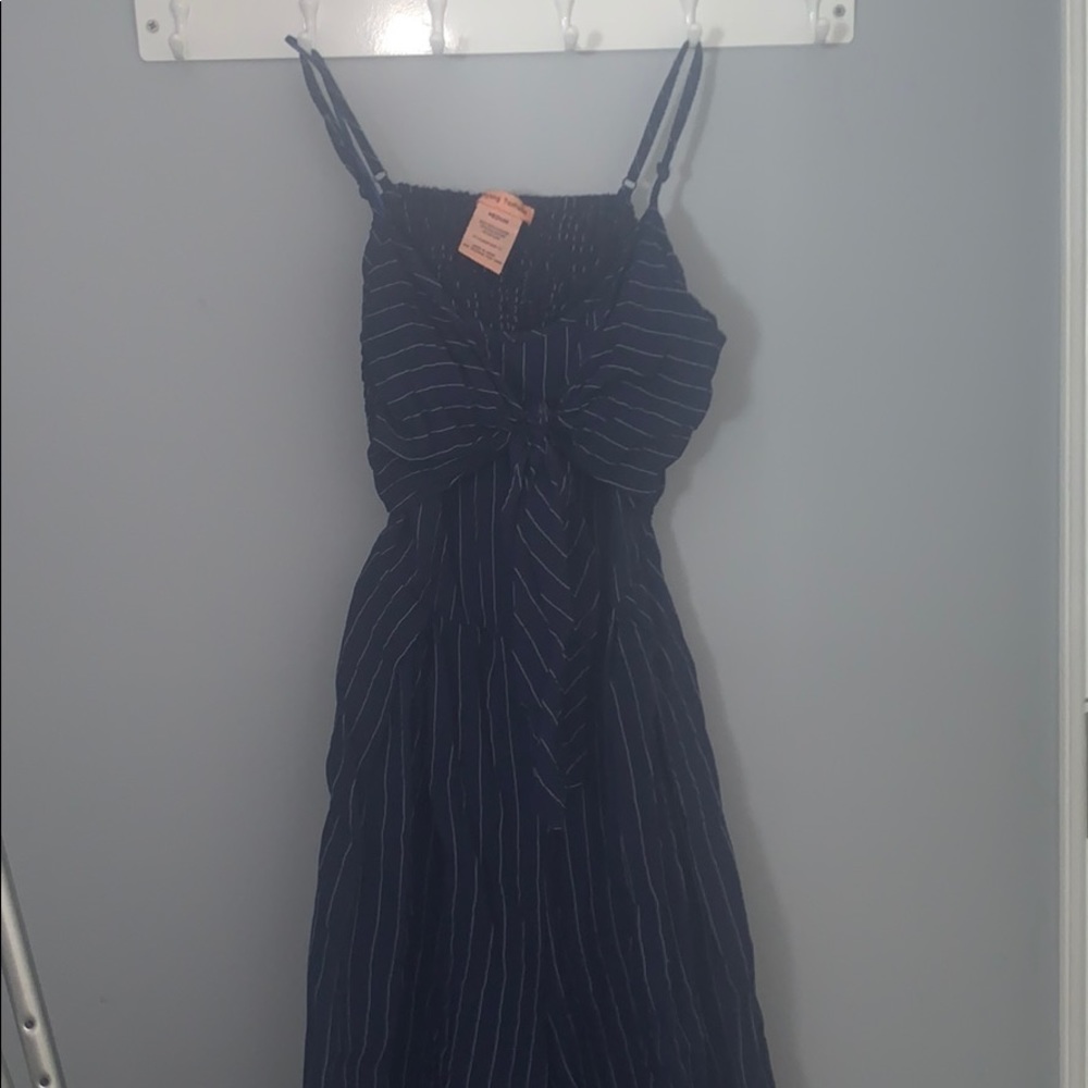 navy blue and white striped jumpsuit